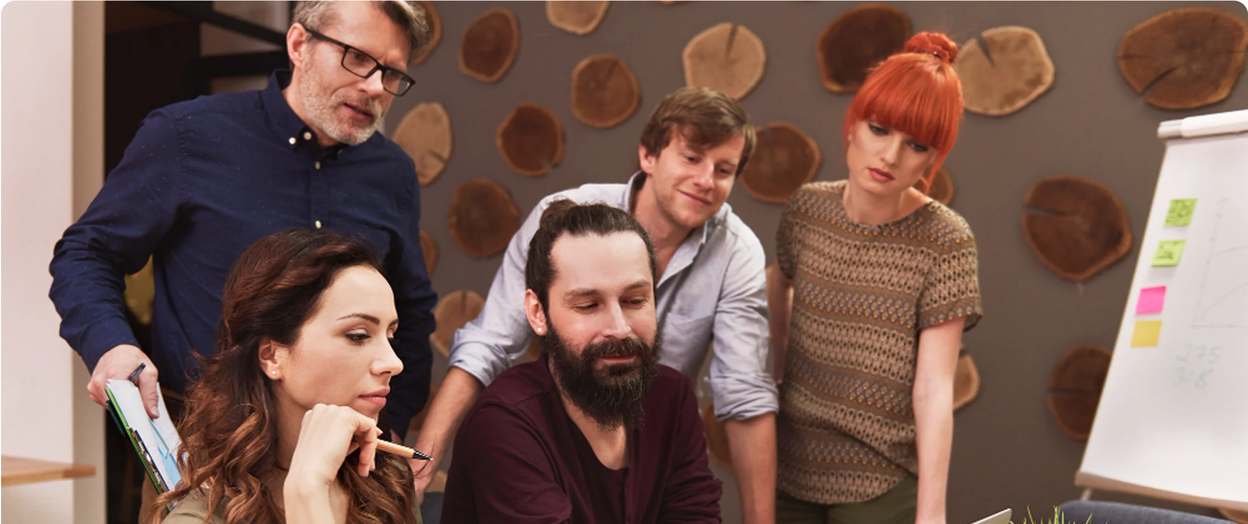 Five colleagues working together.
