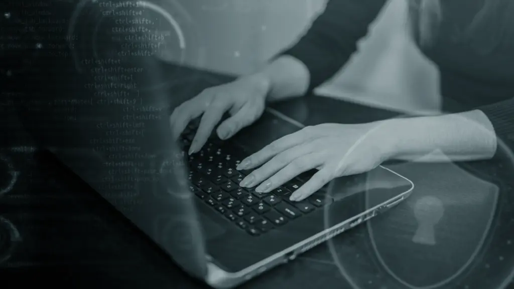 Illustration of a developer securing a Magento website against vulnerabilities and cyber threats